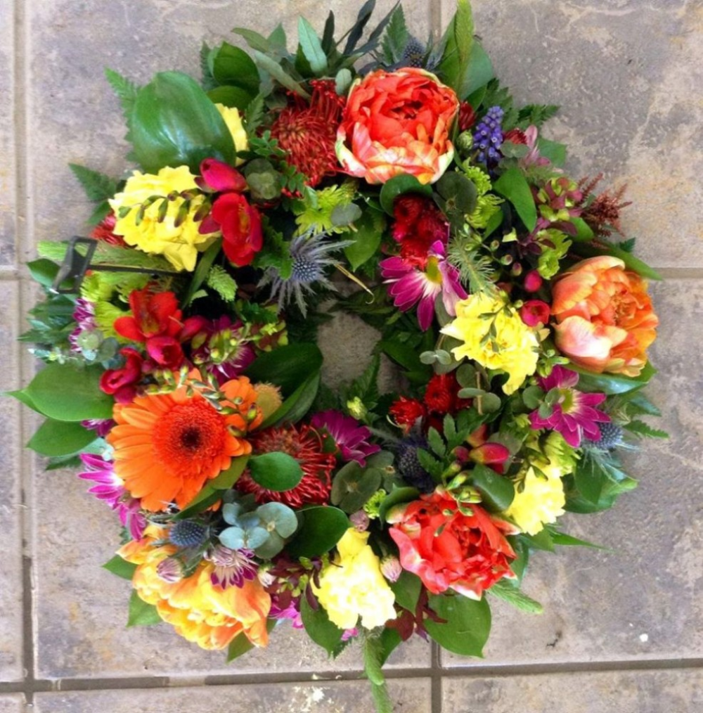 Vibrant Open Styled Funeral Wreath