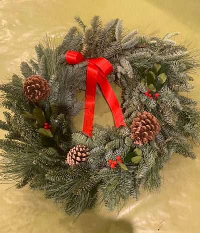 Christmas Grave Wreath - Fresh spruce and pine Christmas Grave Wreath, with pinecones, red ribbon and berried holly.
Size 14"
Delivery or collection available